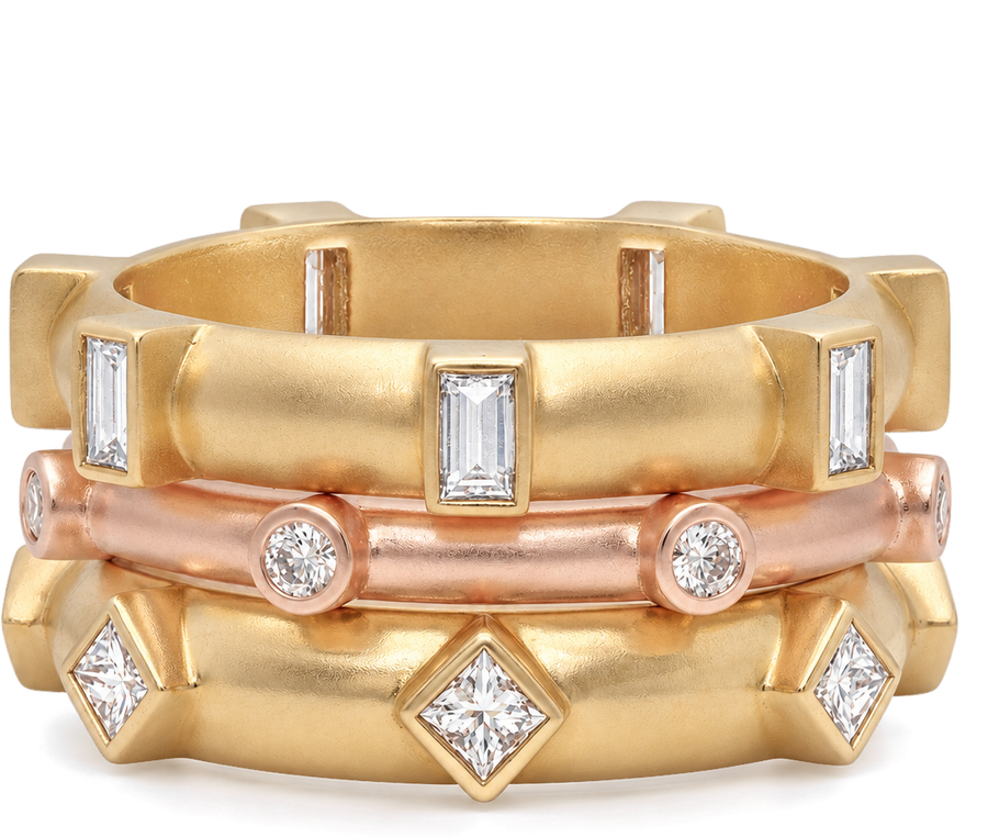 Stack of three 18k gold and rose gold diamond bands