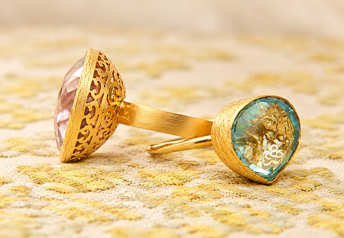 Gold filigree rings with kunzite and aqua gemstones