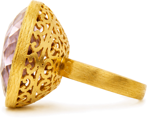 Gold filigree ring with a pink gemstone