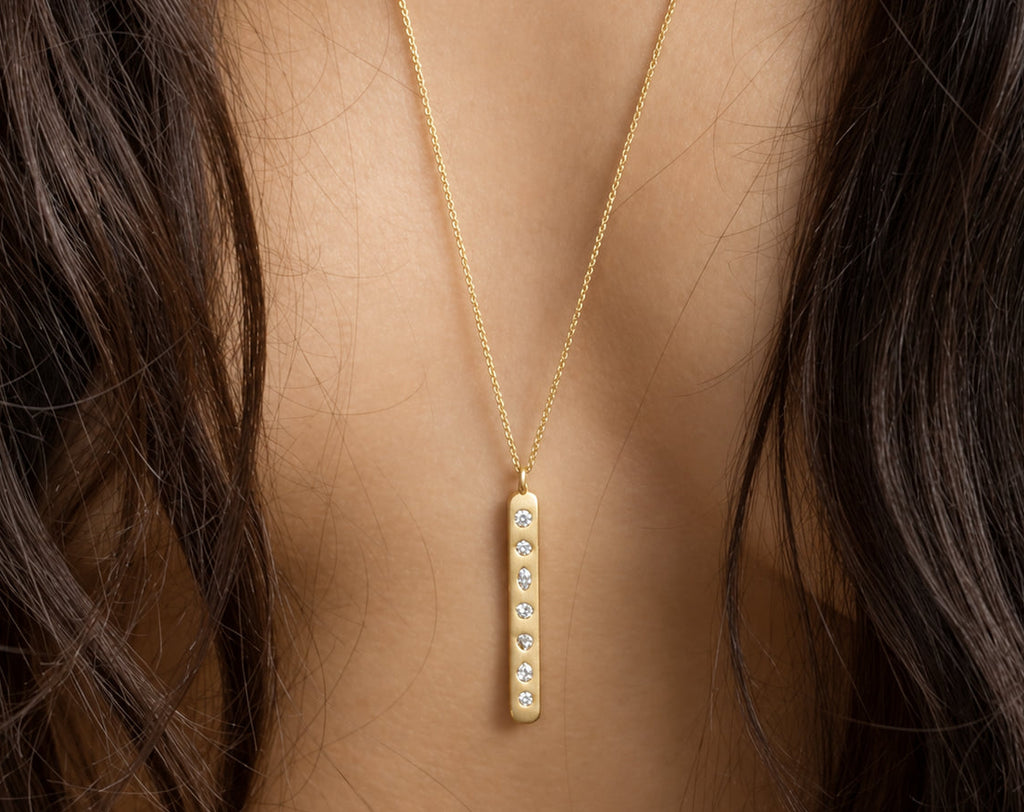 7 Centers Pendant worn